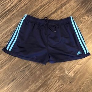 Adidas dark blue shorts with light blue strip